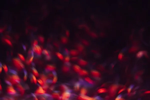 Abstract blurred glittering shine, blue and red — Stock Photo, Image