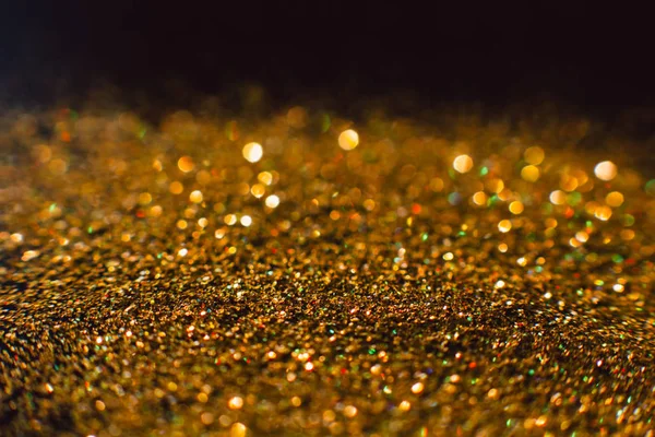 Abstracte lichtend glitters golden vakantie achtergrond — Stockfoto