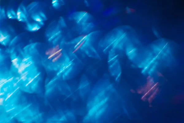 Blue festive blurred lights abstract background — Stock Photo, Image