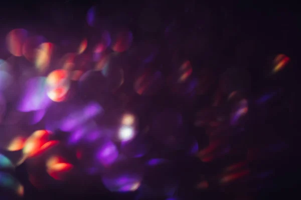 Luz borrosa abstracta bokeh, púrpura y roja . — Foto de Stock