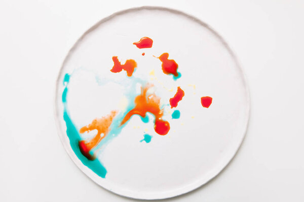 Abstract image of colorful splashes on white