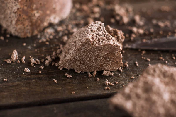 Broken off pieces of aerated chocolate — Stock Photo, Image