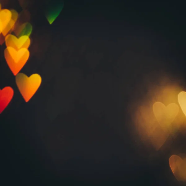 Абстрактний фон барвистих сердець у русі — стокове фото