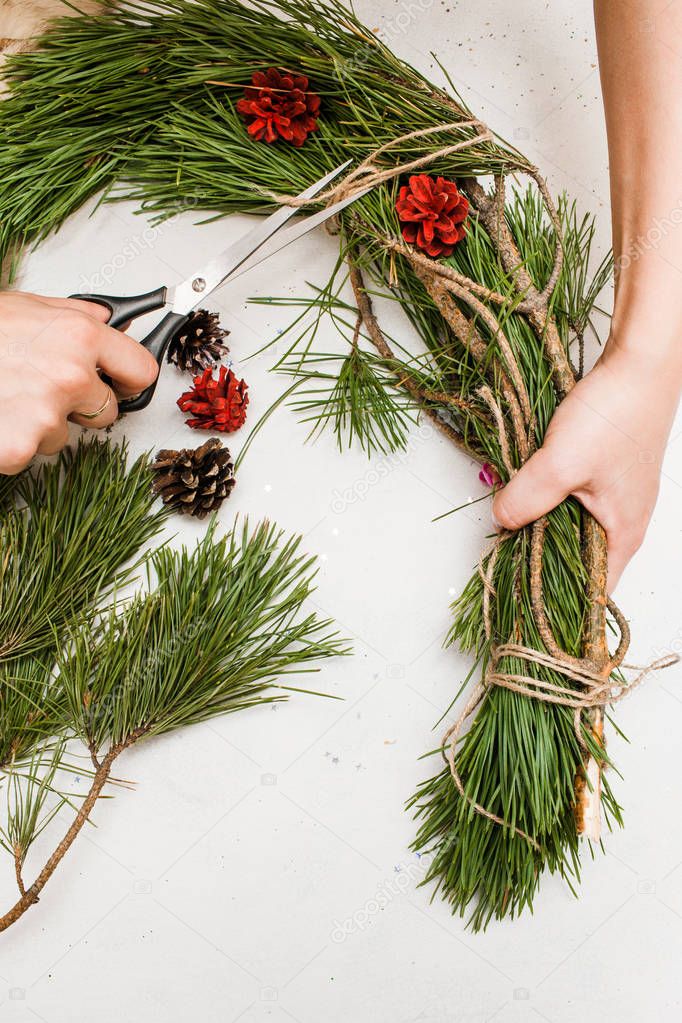 Christmas wreath making by woman