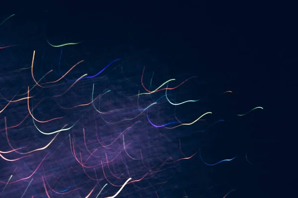 Abstracte achtergrond van kleurrijke bochten in beweging — Stockfoto