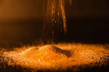 Glitter altın arka plan odak dökme soyut