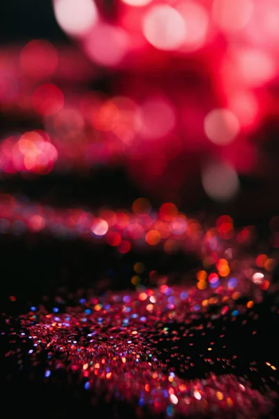 Abstracte rode glitter intreepupil blur bokeh — Stockfoto