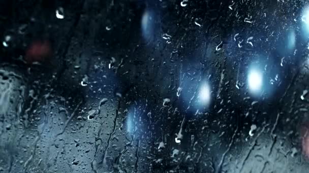 Queda gotas noite chuva molhado janela bokeh luzes — Vídeo de Stock