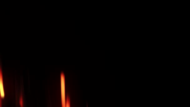 耀眼的黑色背景射线橙色光束运动 — 图库视频影像