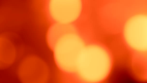 Bokeh záře pozadí červená oranžová kruhy pohyb — Stock video