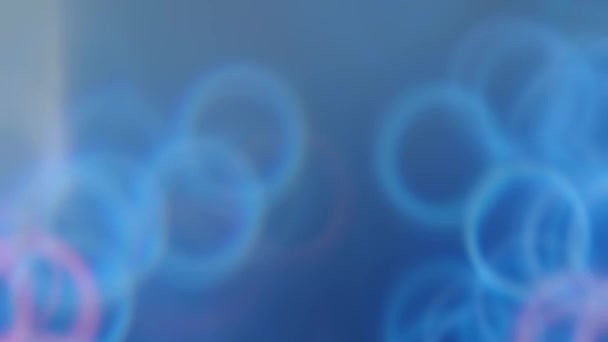 Difuminación efecto brillo superposición azul rosa anillos desenfocados — Vídeo de stock