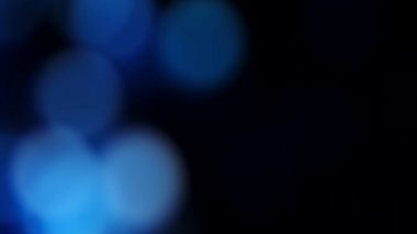 Bulanık parıltı odaklanmış mavi pembe parlayan daireler.