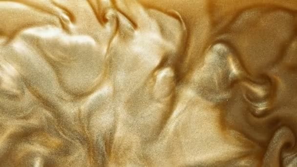 Текстура блестящей краски накладывает золотой поток жидкости — стоковое видео