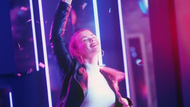 Neon girl happy young woman dancing confetti rain — Stock Video