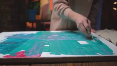 abstract painting talented woman creating strokes