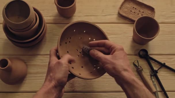 Pottery art handmade ceramics hands polishing bowl — Stok video