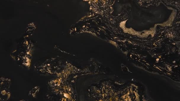 Glitter verf stroom zwart brons vloeistof mix beweging — Stockvideo