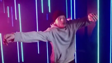 neon light dancer guy street style moves purple