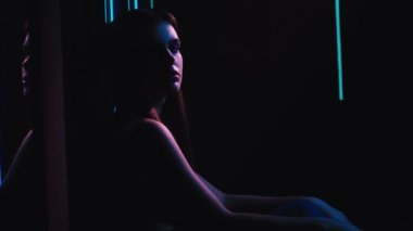 neon lights girl chilling out colored illumination