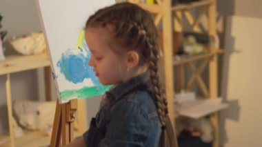 kids finger painting talented girl creating work