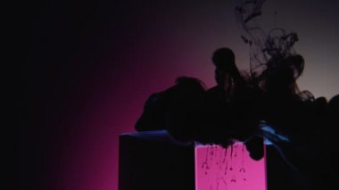 black ink splash smoke cloud flow cube pink light