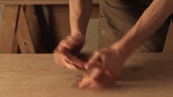 Pottery hobby male artist hands wedging clay — Stock Video