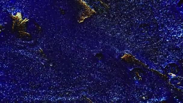 Glitter ink flow phantom blue golden fluid motion — Stock Video