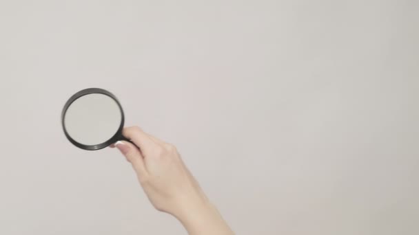 Promotional background hand magnifying glass set 2 — Stock Video