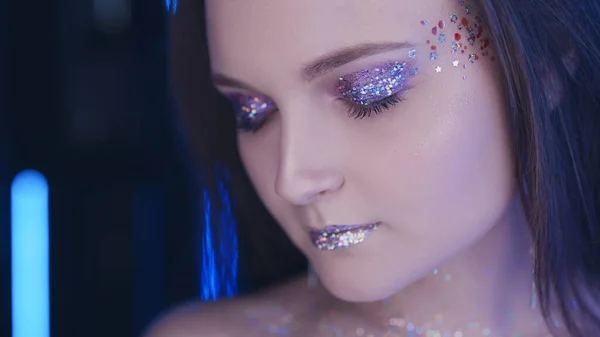 Glitter makeup art woman sparkling lips eyes neon — Stock Photo, Image
