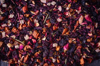 Çay, Kuruyemiş ve kuru çiçekler ile karıştırın. Çay arka plan