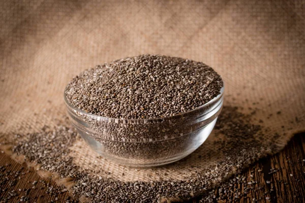 Chia seeds on wooden background — Stock Photo, Image