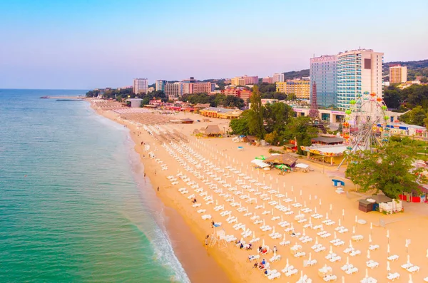 Aerial top view on the sandy beach. Umbrellas, sand and sea wave — 스톡 사진