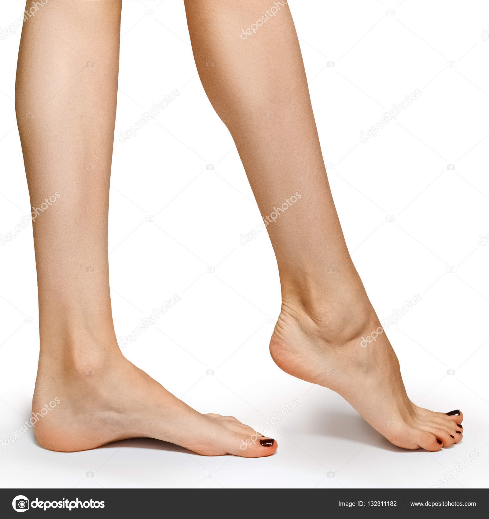 Low side view of woman foot on white background, close-up. Stock Photo by  ©boomeart 132311182