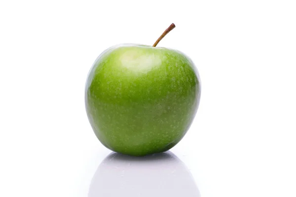 Fresh green apple with reflection on white background Stock Image