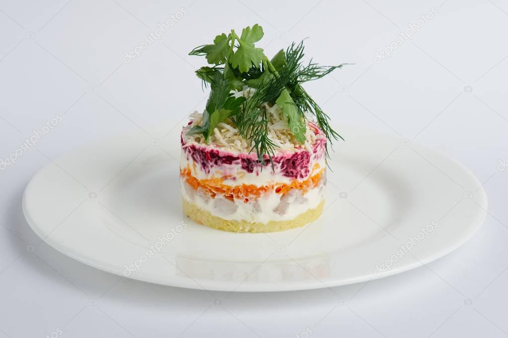 Traditional russian salad herring with beetroot, carrot , potato