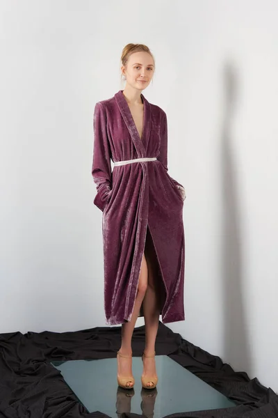 Happy girl in velvet long dress — Stock Photo, Image