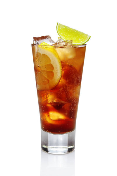 Cocktail whiskey with cola, ice, lemon and lime in highball glas