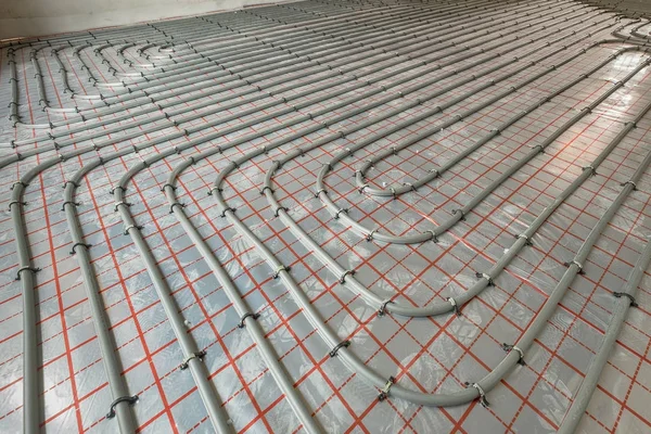 Warm floor. Home heating system installation.