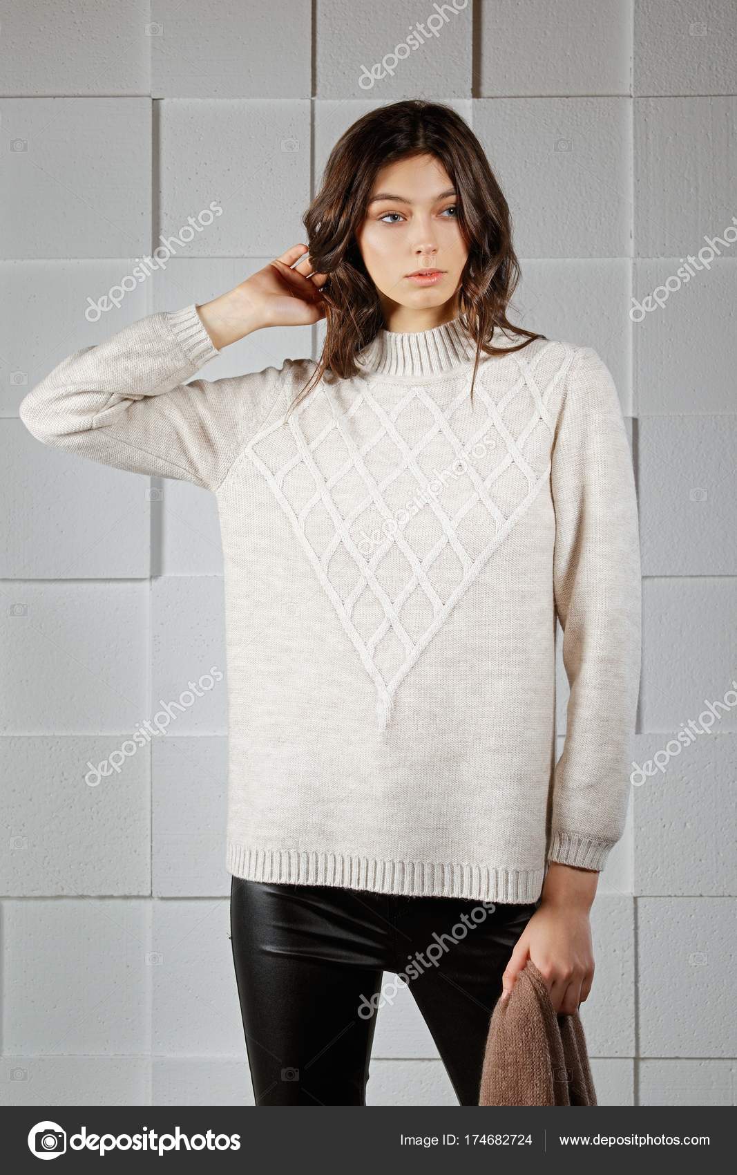 white sweater grey pants