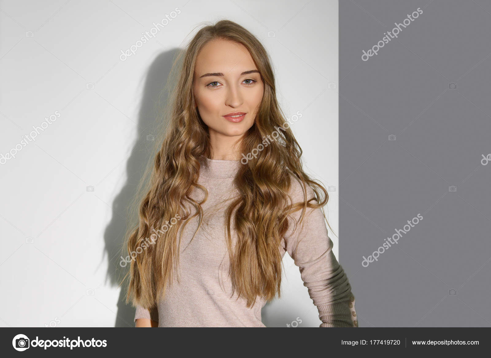 Beautiful Girl With Long Curly Blonde Hair Natural Makeup And