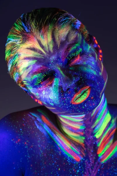 stock image Portrait of beautiful girl with ultraviolet paint on her face. G