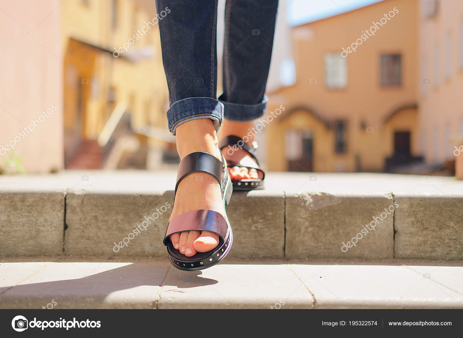 legs sandals descending the stairs in the city Stock by ©boomeart 195322574