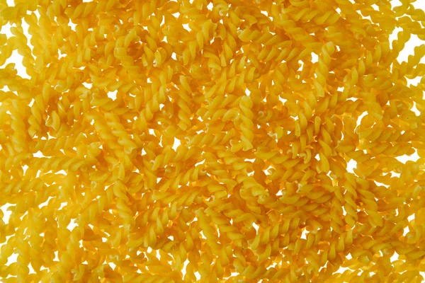 Bovenaanzicht van fusilli pasta geïsoleerd op wit — Stockfoto