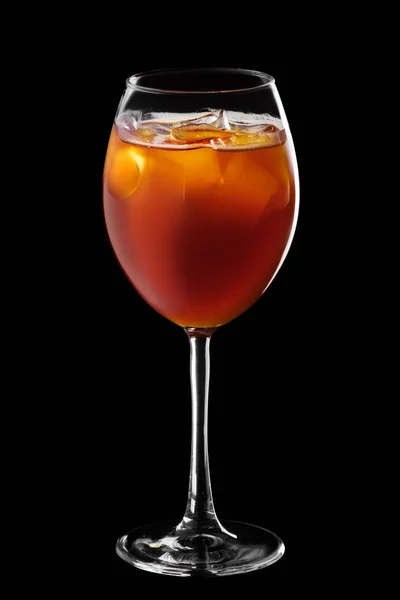 Wine glass with mixed beer, tonic and coffee cocktail isolated on black — 스톡 사진