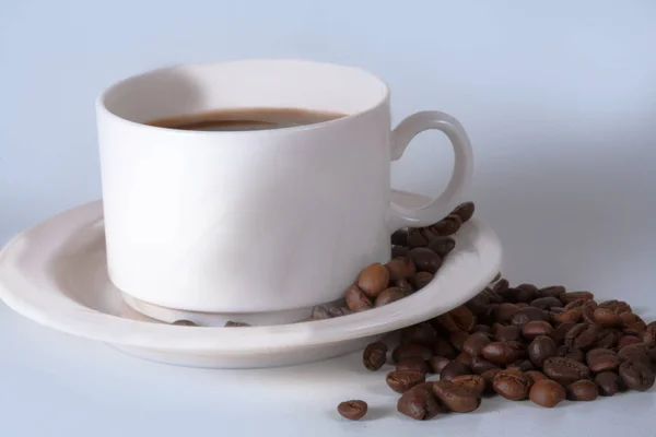 Kaffekopp och bönor . — Stockfoto