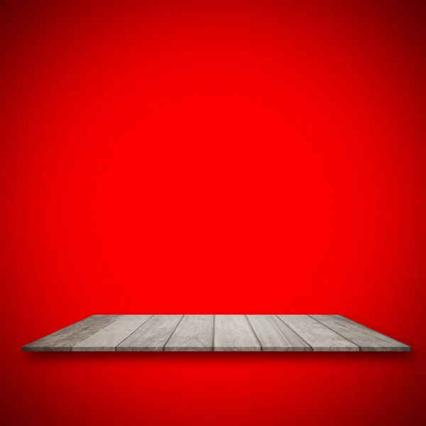 空の上の木製のテーブルと赤のグラデーションの背景。商品の展示 — ストック写真