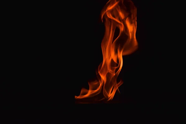 Beautiful fire flames on black background. — Stock Photo, Image