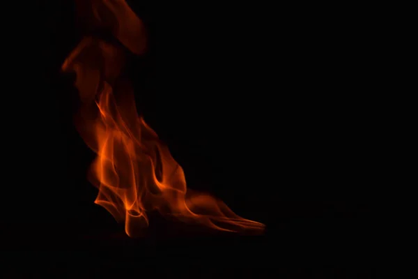 Beautiful fire flames on black background. — Stock Photo, Image