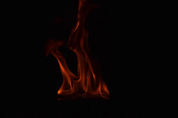 Beautiful fire flames on black background. — Stock Photo, Image