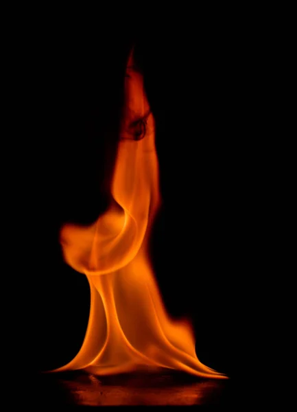 Beautiful fire flames on black background. — Stock Photo, Image